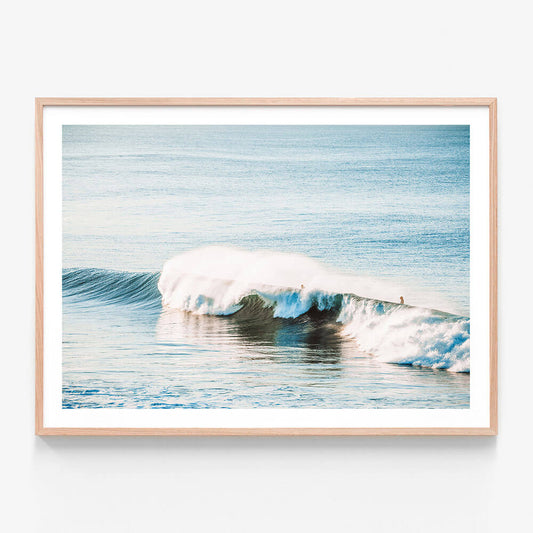 A framed photo print of a surfer at Bells Beach along the great ocean road Australia.