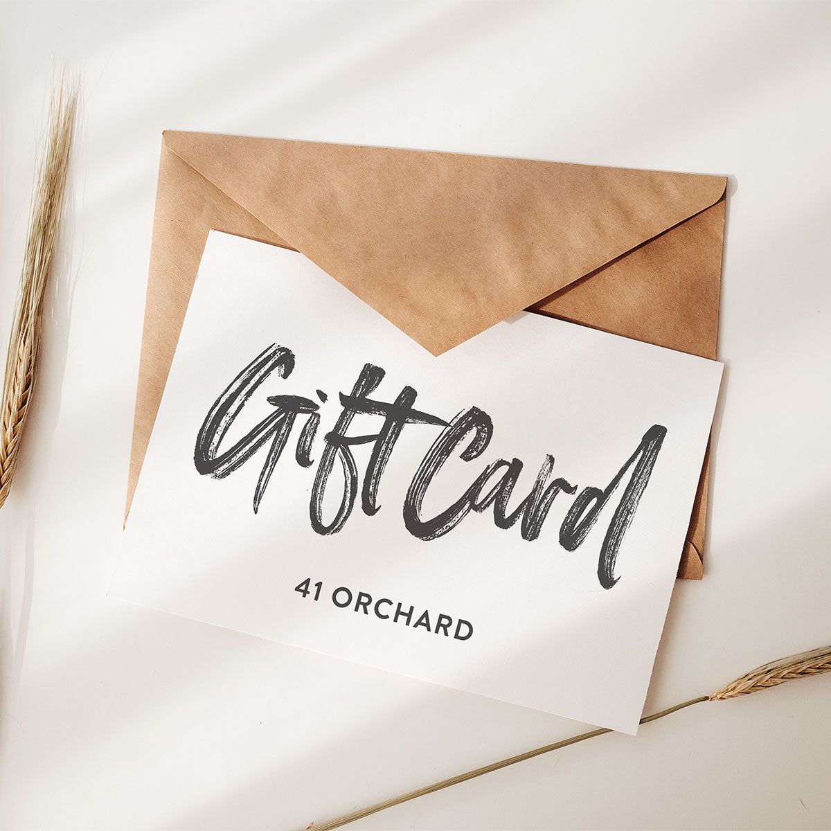 A gift card for buying wall art prints with 41 Orchard