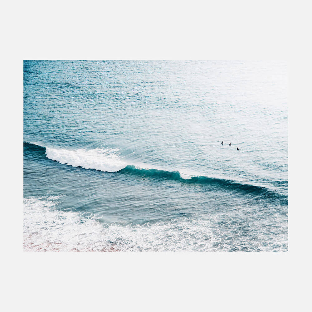 Three Surfers