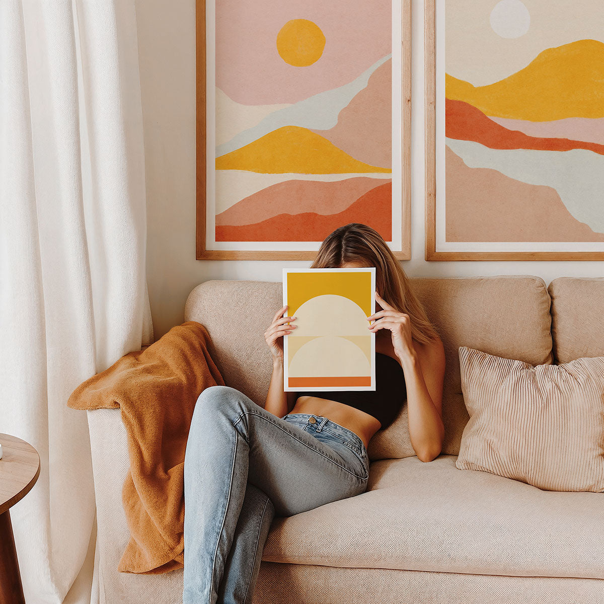 A boho style interior with boho wall art prints