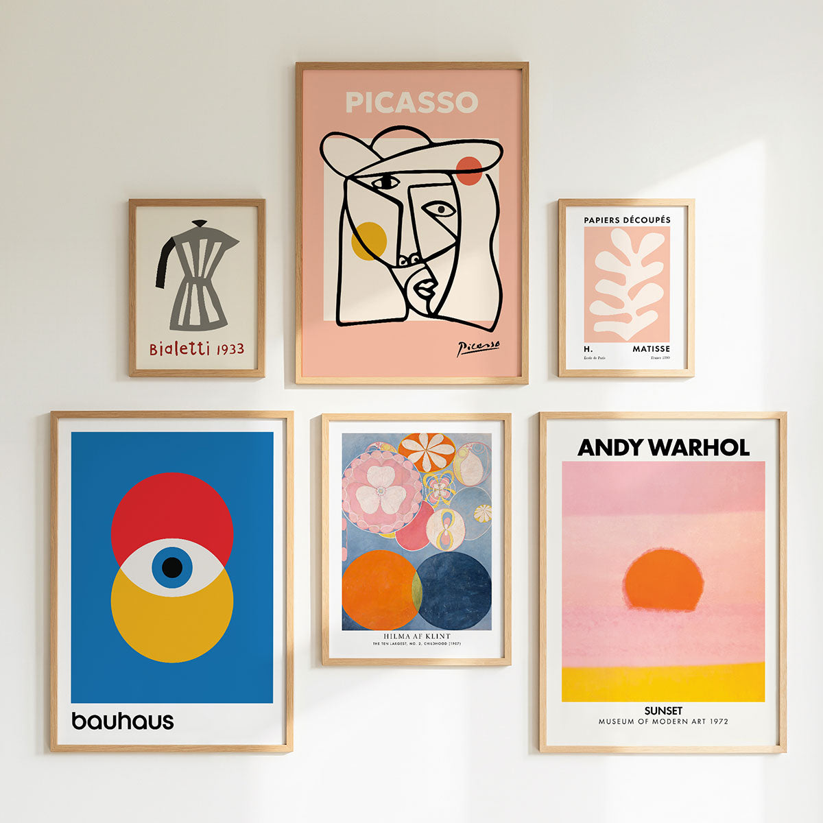 A collection of framed wall art prints by famous artists