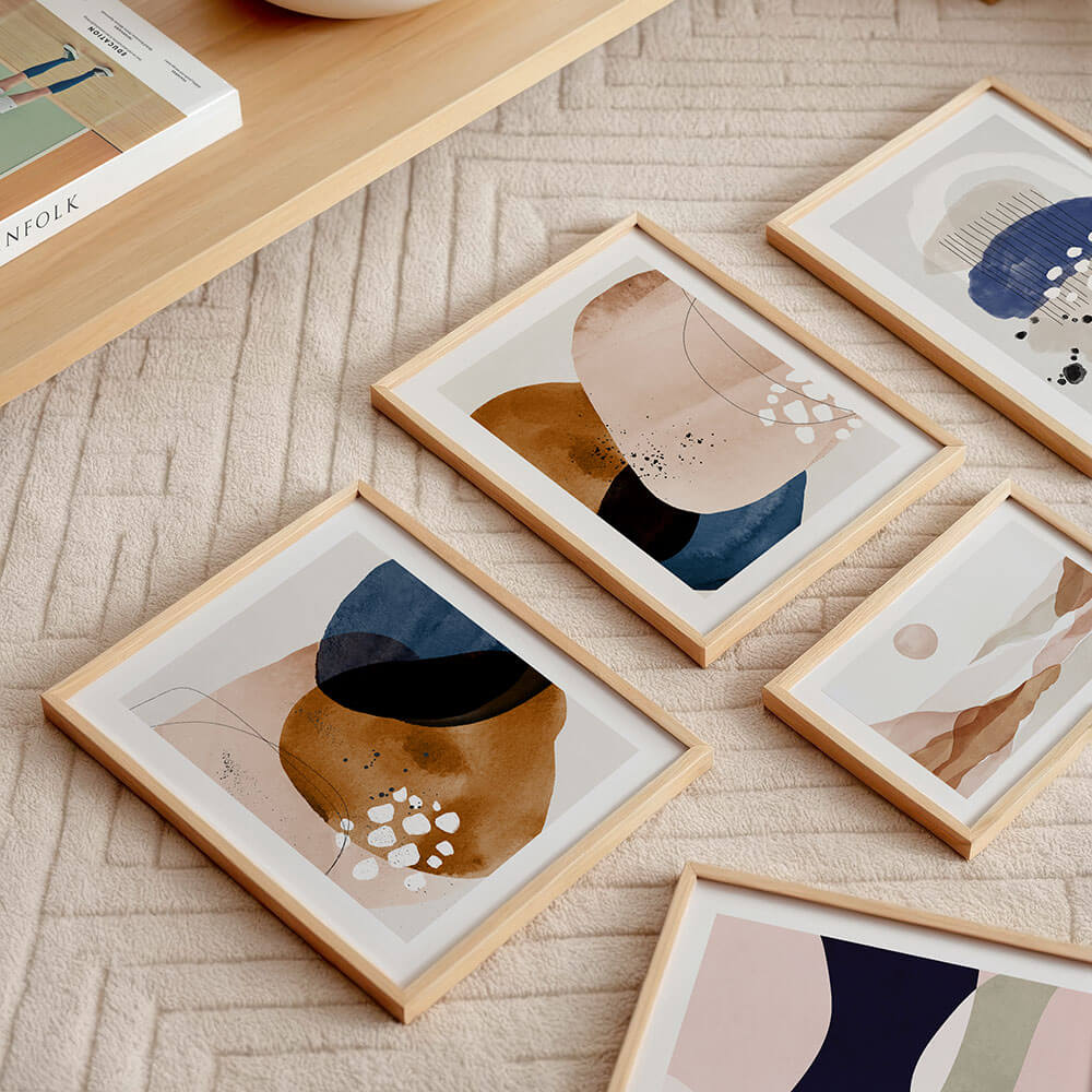 A collection of abstract art framed prints and posters.