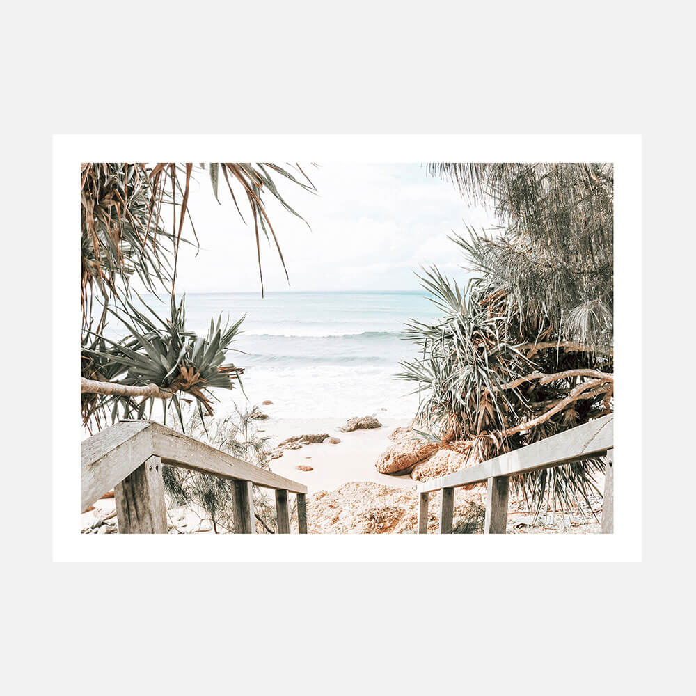 A costal photo print of a beach scene with a wooden pathway leading to the ocean