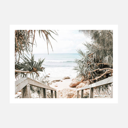 A costal photo print of a beach scene with a wooden pathway leading to the ocean