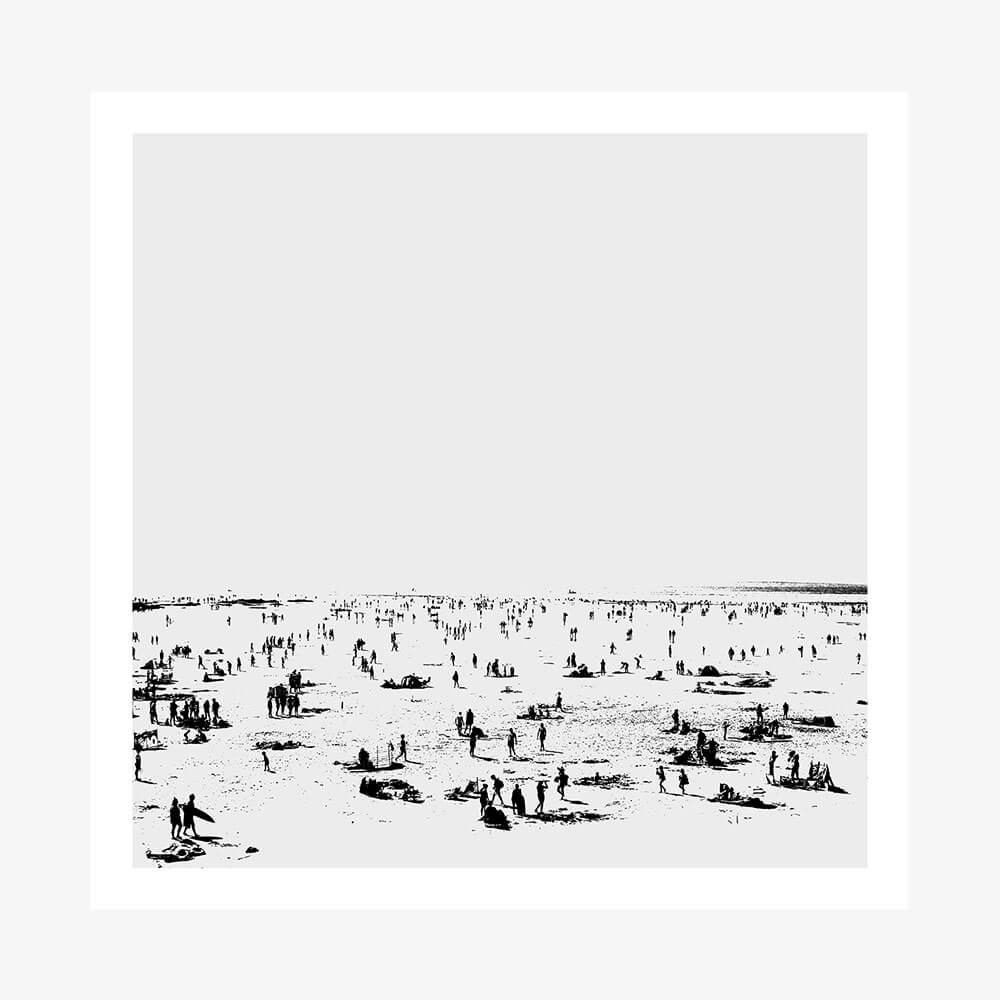 A black and white photo wall art print of the beach