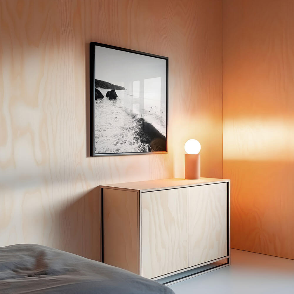 A black and white photography framed print in a minimalist interior