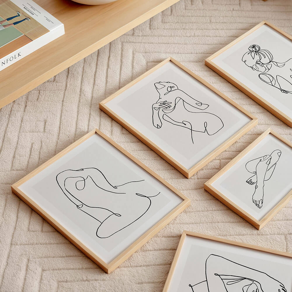 A collection of female line art illustration Framed Prints.