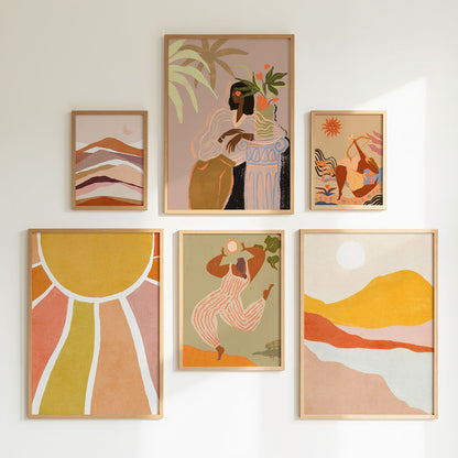 Set of six boho style artworks in wooden frames arranged in a gallery wall layout.