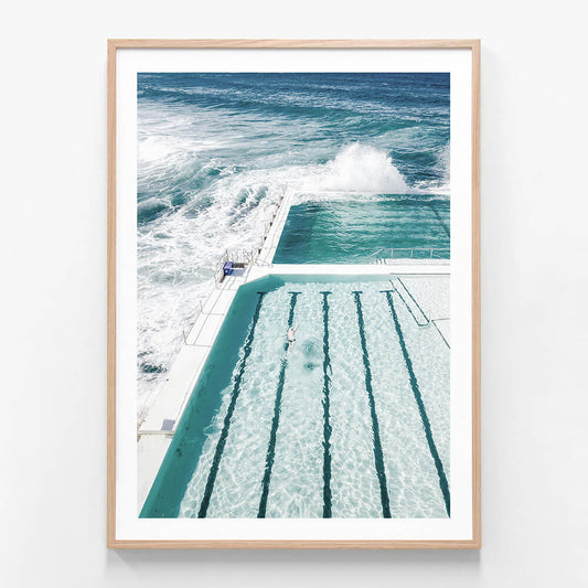 A portrait orientation framed print of the icebergs pool at Bondi beach.