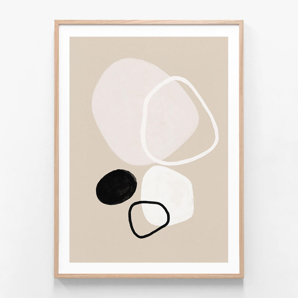 A minimalist framed artwork featuring abstract shapes in beige, black, and white colors.