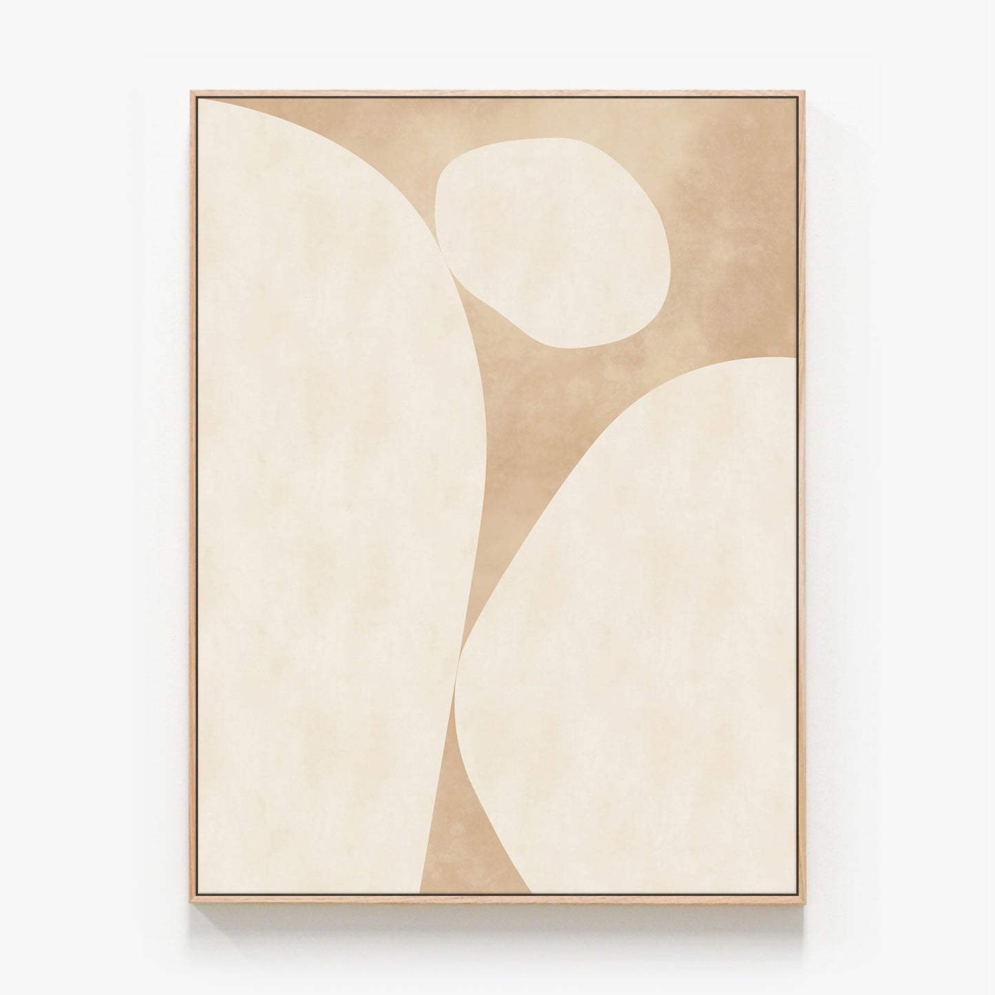 An framed canvas print of an abstract art painting called 'Neutral Stones.' Simple colours of beige and cream.