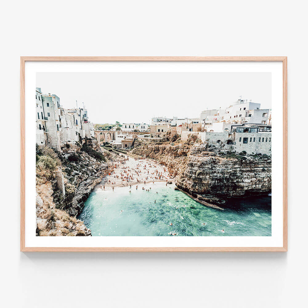 A framed photography print featuring Polignano a Mare.