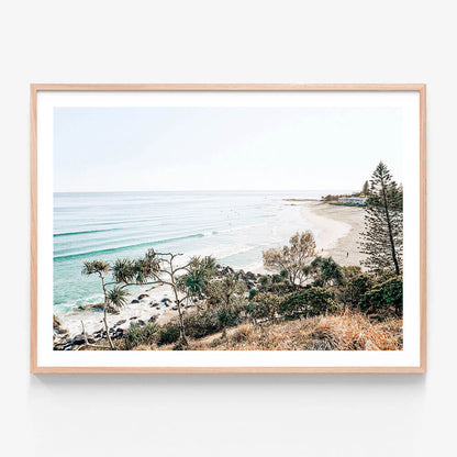 Rainbow Bay Beach wall art print in oak frame