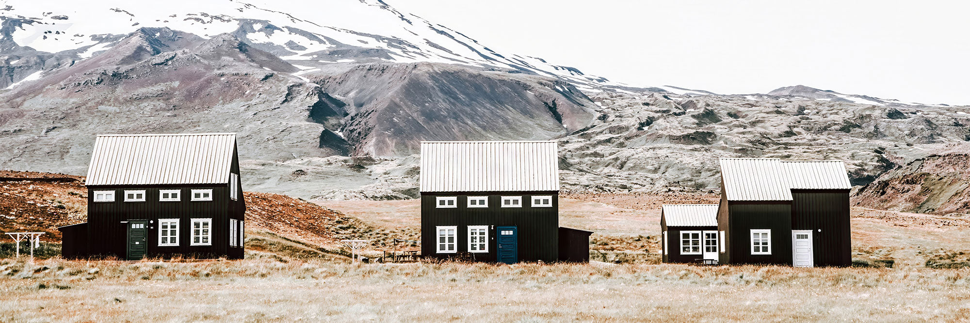A Scandinavian landscape photography wall art print with mountains in the background.