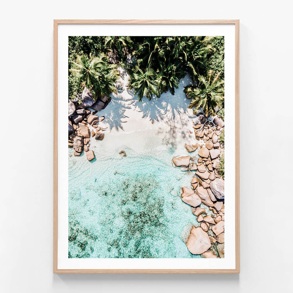 Secluded Seychelles wall art print in oak frame