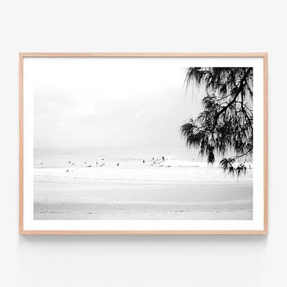 A framed photo wall art print featuring Snapper Rocks beach in black and white 