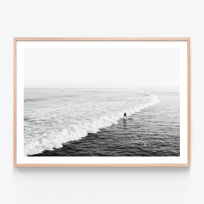 Solo Surfer BW wall art print in oak frame