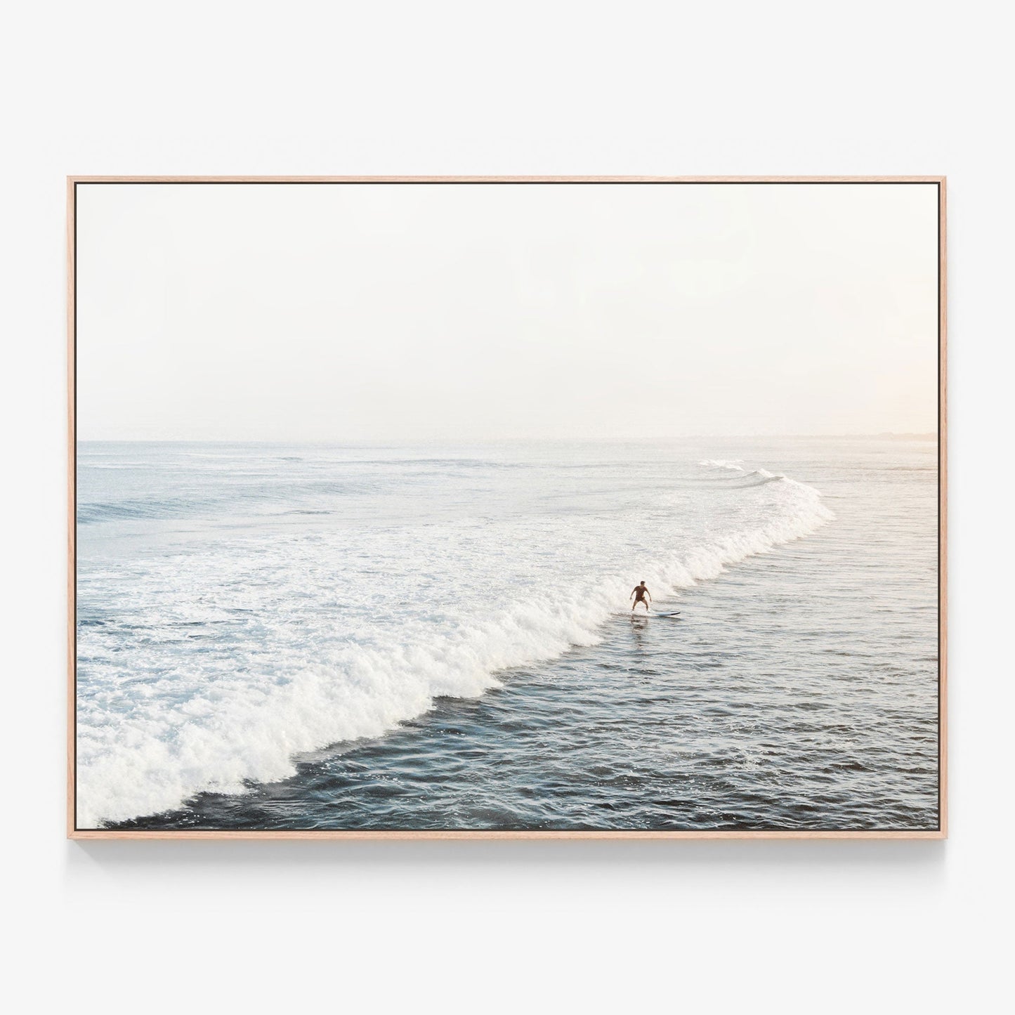 Photo of a Solo Surfer riding a wave Canvas wall art with print oak float frame
