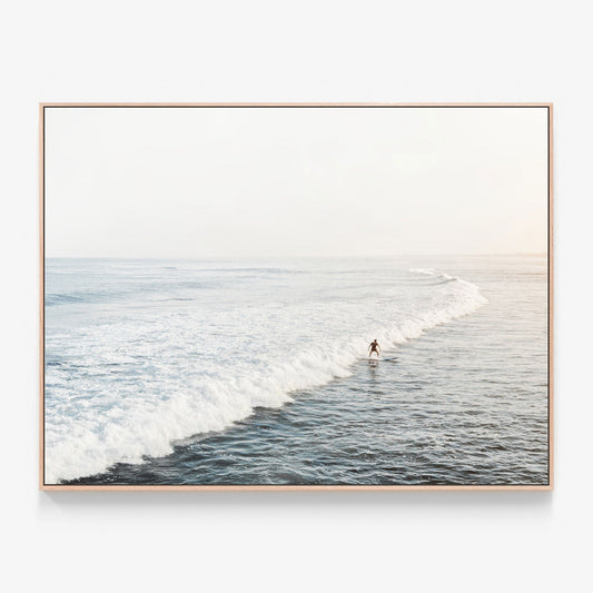 Photo of a Solo Surfer riding a wave Canvas wall art with print oak float frame