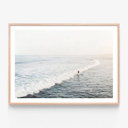Solo Surfer wall art print in oak frame