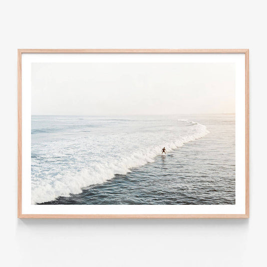 Solo Surfer wall art print in oak frame