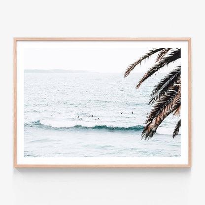 A coastal framed print featuring the beach