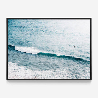 Three Surfers