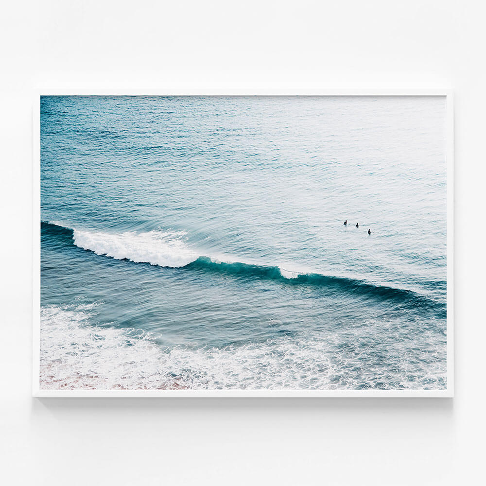 Three Surfers