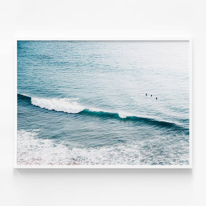 Three Surfers