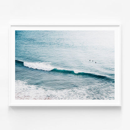 Three Surfers