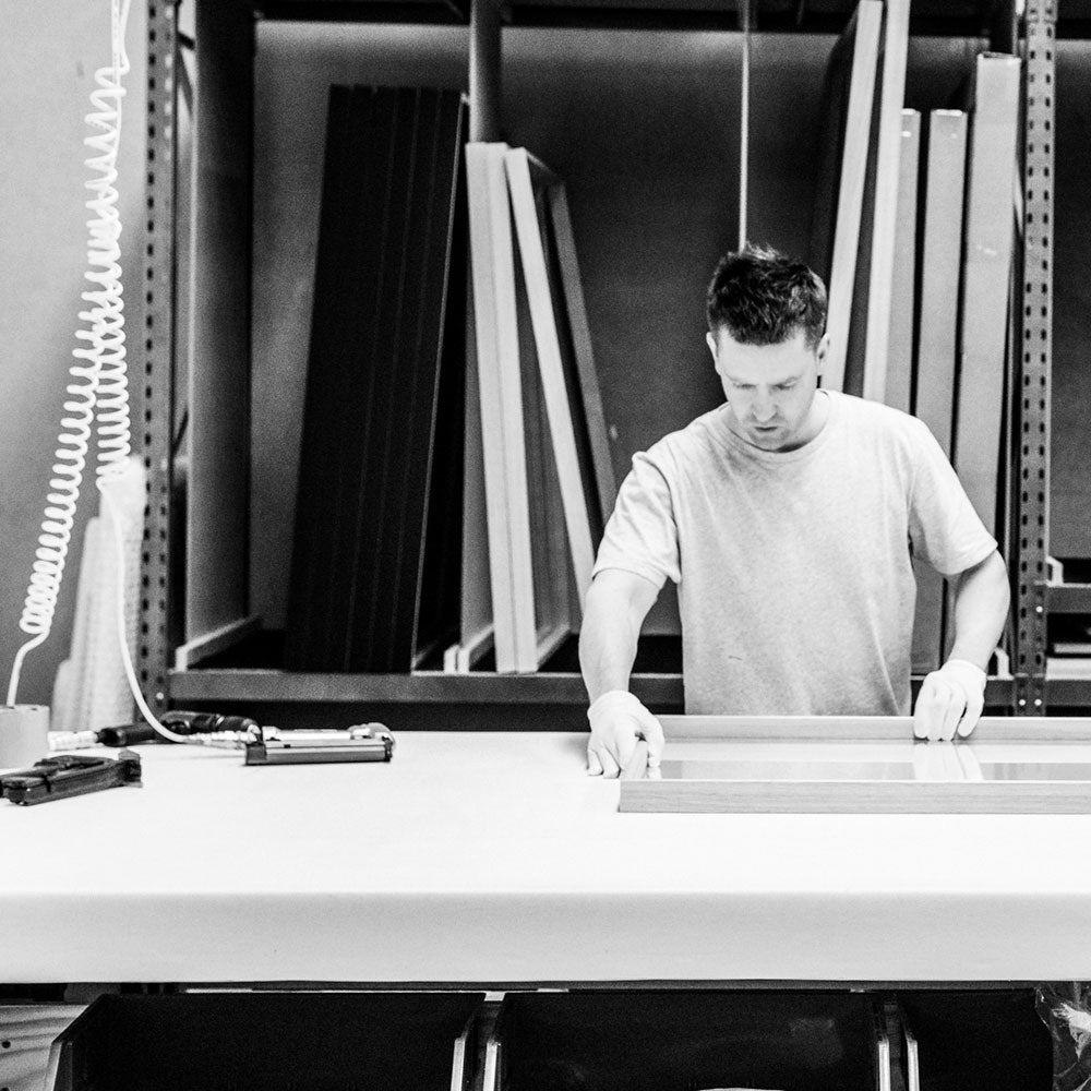 Tom working on some picturing framing in our Geelong framing shop.