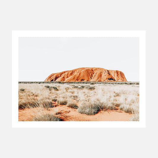 A photography poster print of Uluru - Ayres rock in the Australian outback.