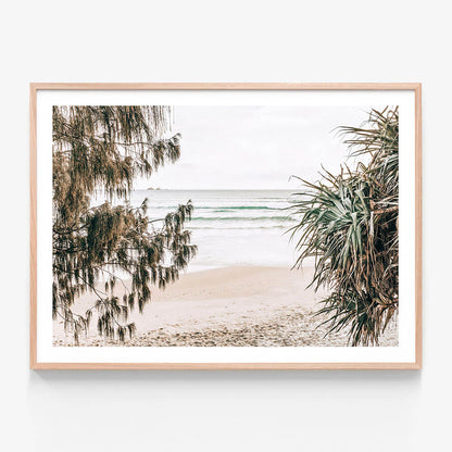 A framed photo wall art print featuring
an Australian coastal scene looking out to the ocean.