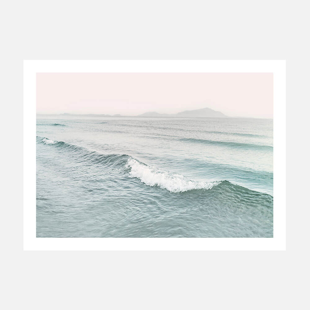 A photo wall art print featuring a wave in pastel tones