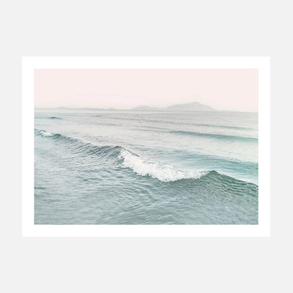 A photo wall art print featuring a wave in pastel tones